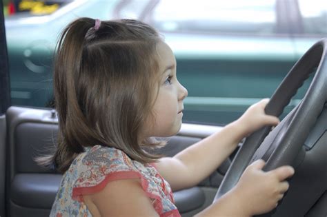 Child driving a car